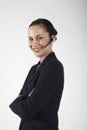 Friendly Businesswoman Wearing Wireless Headset