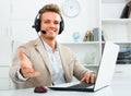 Call center male operator talking with client Royalty Free Stock Photo