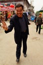 Friendly Chinese Man Giving Peace Sign, Kaifeng