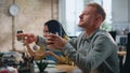 Friendly colleagues talking work break sitting modern office workplace close up. Royalty Free Stock Photo