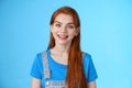 Friendly confident pleasant redhead woman helpfully look camera, smiling joyfully, have conversation customer, give