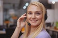 Friendly customer support operator with headset working at call center Royalty Free Stock Photo