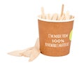 Friendly disposable coffee cup on a white background. Wooden forks and spoons