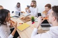 Business team eating sharing pizza Royalty Free Stock Photo
