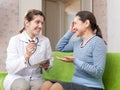 Friendly doctor asked happy female patient feels