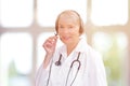 Friendly doctor headset webcam view Royalty Free Stock Photo
