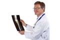Friendly doctor holds knee x-ray and smiles Royalty Free Stock Photo