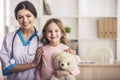 Friendly Doctor with Small Patient. Royalty Free Stock Photo