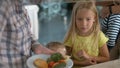 Friendly family at breakfast in the hotel Royalty Free Stock Photo