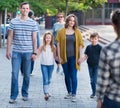 Friendly family going in the park together Royalty Free Stock Photo