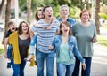 Friendly family going in the park together Royalty Free Stock Photo