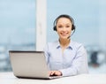 Friendly female helpline operator Royalty Free Stock Photo