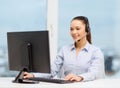 Friendly female helpline operator Royalty Free Stock Photo