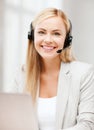 Friendly female helpline operator Royalty Free Stock Photo