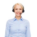 Friendly female helpline operator with headphones Royalty Free Stock Photo