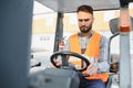 friendly forklift driver at work Royalty Free Stock Photo