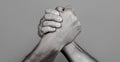 Friendly handshake, friends greeting, teamwork, friendship. Handshake, arms, friendship. Hand, rivalry, vs, challenge Royalty Free Stock Photo