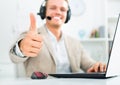 Call center male operator talking with client Royalty Free Stock Photo