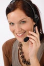 Friendly help desk woman smiling Royalty Free Stock Photo