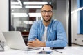 Confident Indian businessman working in modern office Royalty Free Stock Photo