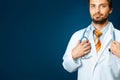 Friendly Male Doctor In White Coat Holds Hand On Stethoscope. People Care Medicine Insurance Concept