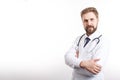 Friendly Male Doctor in White Smock Posing With Stethoscope