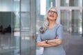 Friendly middle aged business female leader laughing, happy old businesswoman enjoying smiling, mature business coach and executiv Royalty Free Stock Photo