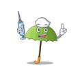 Friendly nurse of green umbrella mascot design holding syringe Royalty Free Stock Photo