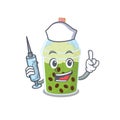 Friendly nurse of matcha bubble tea mascot design holding syringe Royalty Free Stock Photo