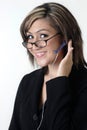 Friendly receptionist/call center in glasses Royalty Free Stock Photo