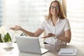 Friendly receptionist invites visitors on meeting