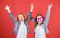 Friendly relations siblings. Sincere cheerful kids share happiness and love. Girls funny big eyeglasses cheerful smile Royalty Free Stock Photo