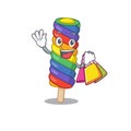 A friendly rich rainbow ice cream waving and holding Shopping bag