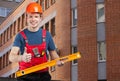 Friendly smiling construction worker showing thumbs up Royalty Free Stock Photo