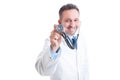 Friendly smiling medic or doctor holding stethoscope