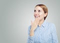 Friendly surprised woman student or young businesswoman on white background Royalty Free Stock Photo