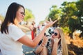 Friendly talk. Two beautiful young women walking along the street and talking. Royalty Free Stock Photo