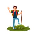 Friendly tourist waving hand. Young guy with wooden stick and backpack. Hiker standing on grass. Outdoor activity. Flat Royalty Free Stock Photo