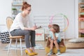 Psychologist talking with little boy Royalty Free Stock Photo