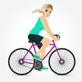 Friendly young girl riding bicycle happy
