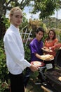 Friends at a backyard bar-b-que