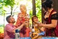 Friends in Bavarian beer garden drinking in summer Royalty Free Stock Photo