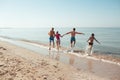 Friends on the beach. Have fun at sunny summer day