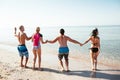 Friends on the beach. Have fun at sunny summer day