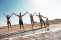 Friends on the beach. Have fun at sunny summer day