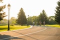 Friends biking on country road.