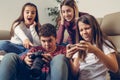 Friends checking photos on a camera Royalty Free Stock Photo