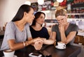 Friends, coffee and sad woman in cafe for support in mental health, counselling and help for stress. Restaurant, trust Royalty Free Stock Photo