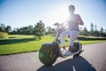 Friends cycling in park Royalty Free Stock Photo