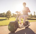 Friends cycling in park Royalty Free Stock Photo